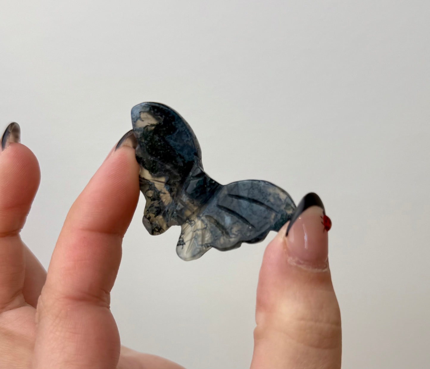 Moss agate butterfly carvings