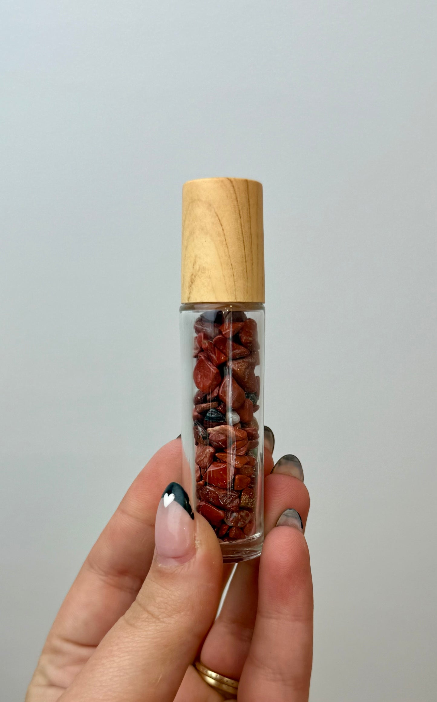 Red jasper chip roller bottle