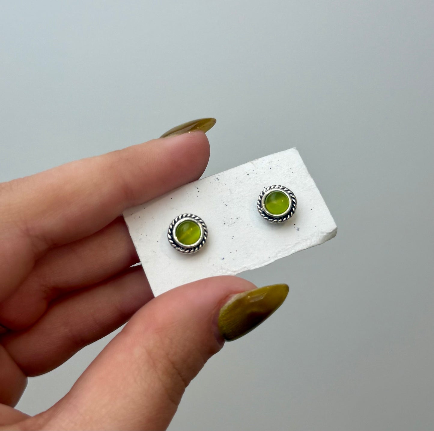 Green cats eye man made material earrings thrifted find