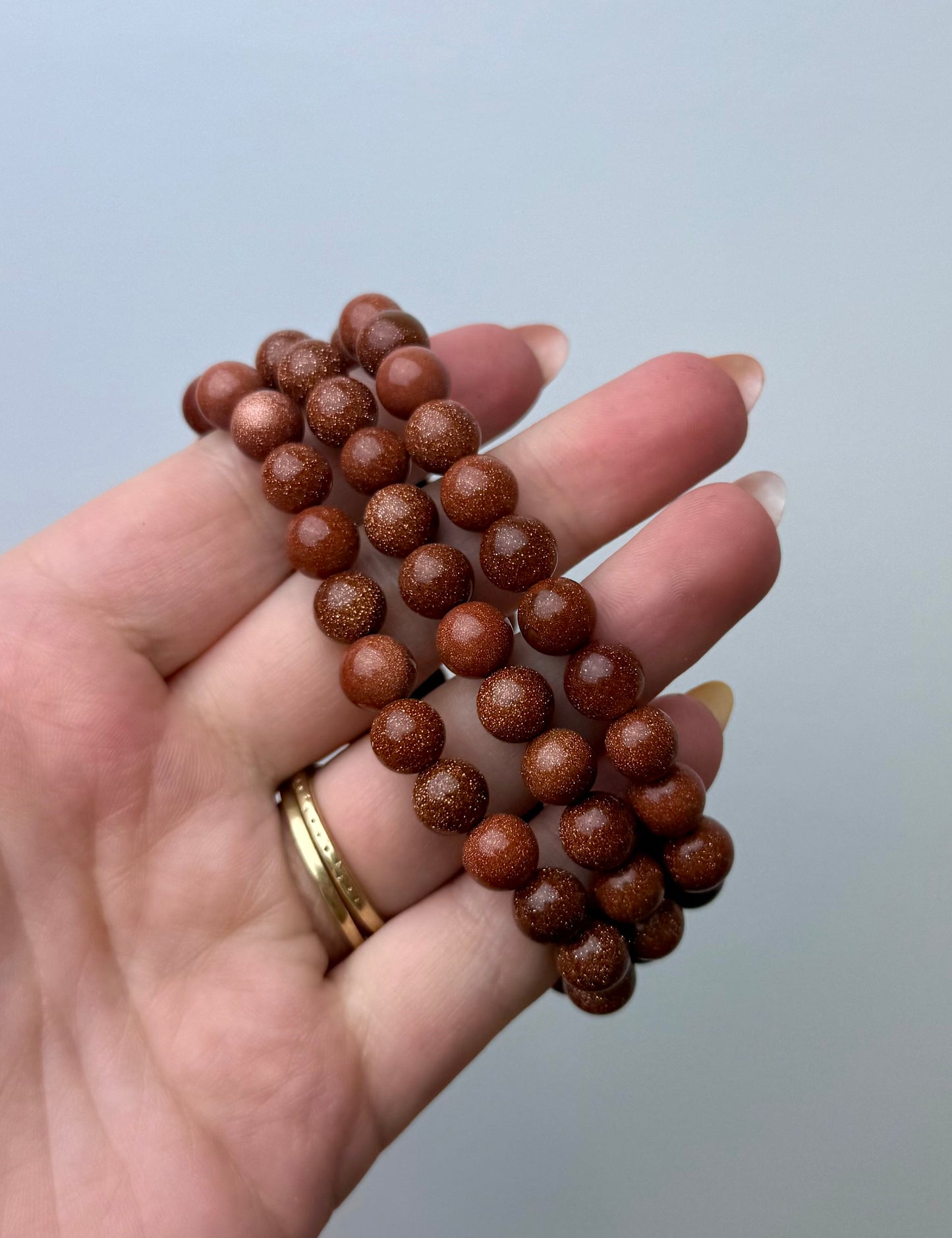 Man made material goldstone bracelets