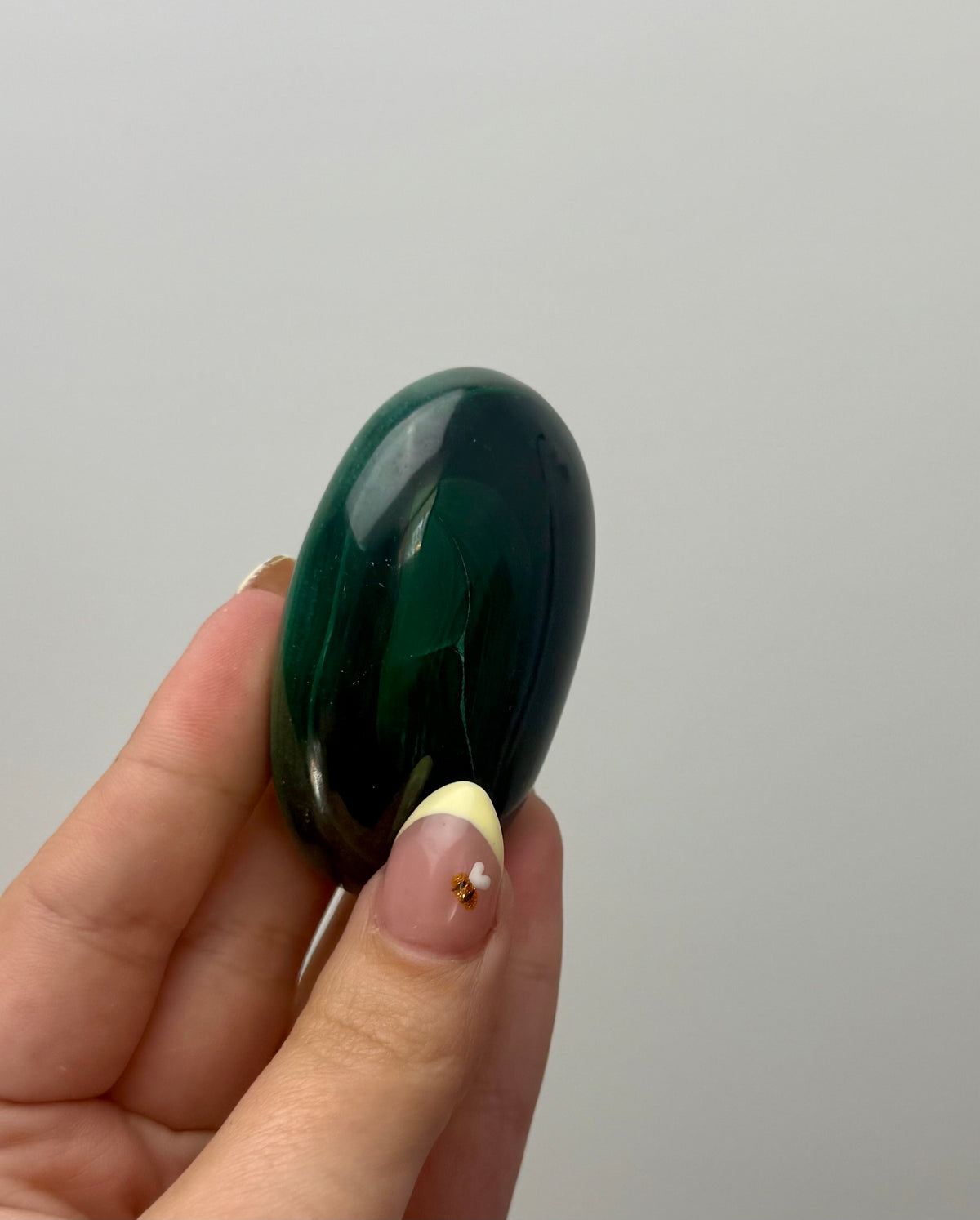 Malachite palm stone A