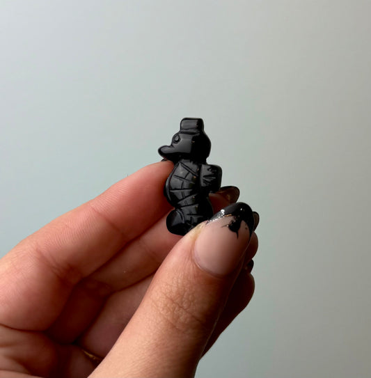 Obsidian seahorse carving