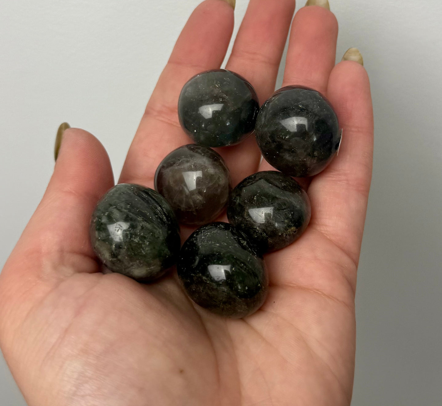 Green rutile quartz tumbles