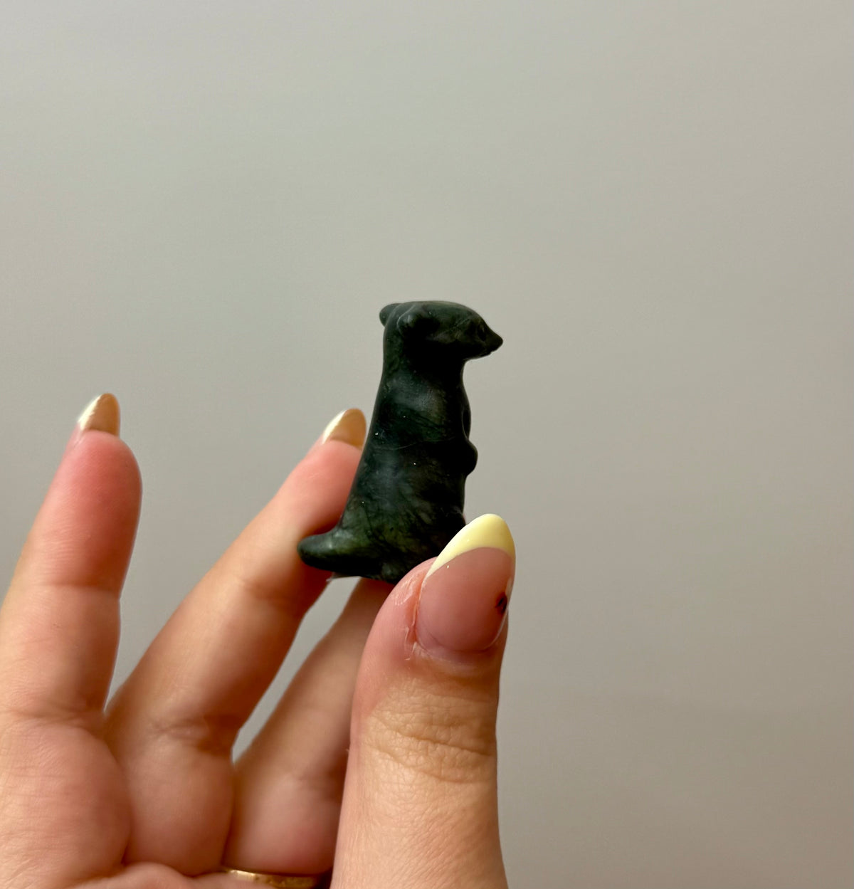 Jade meerkat carving
