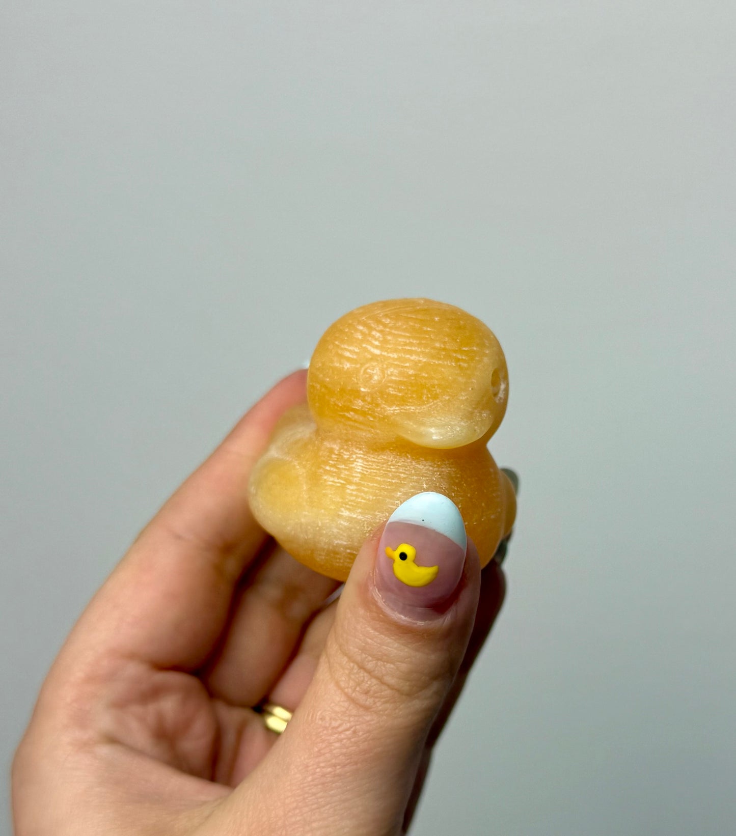 Orange calcite duck carvings