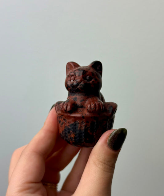 Cat in a basket carving