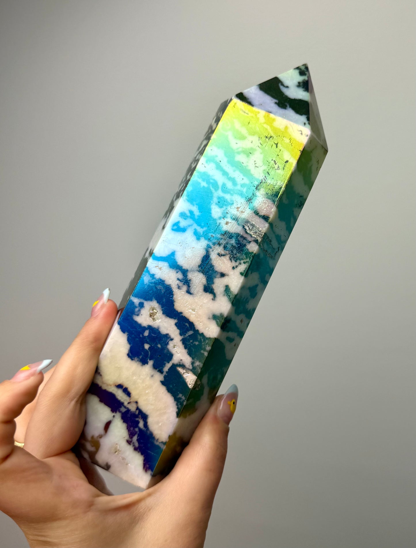 Aura coated altered zebra jasper tower