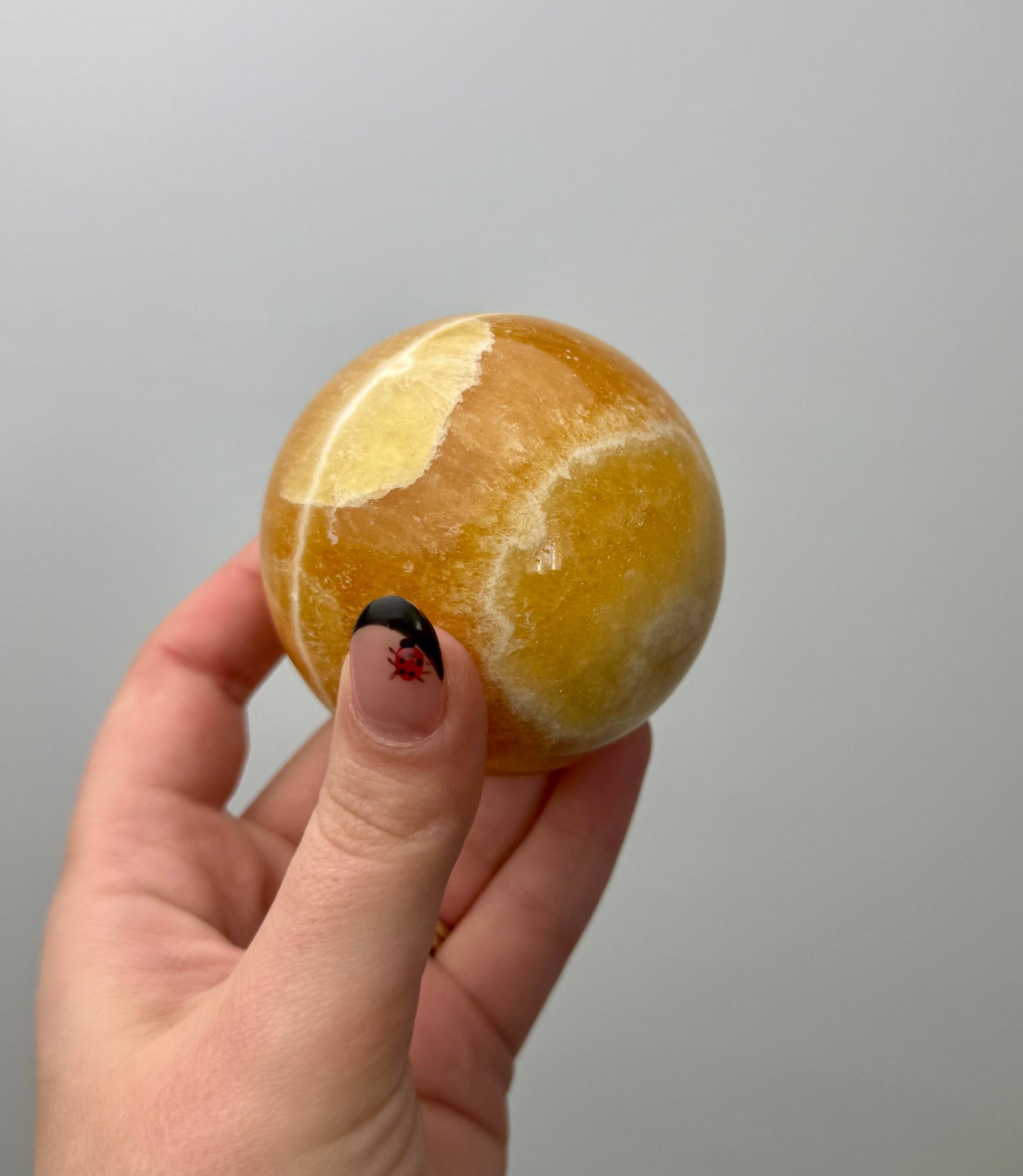 Orange calcite sphere