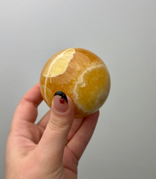 Orange calcite sphere