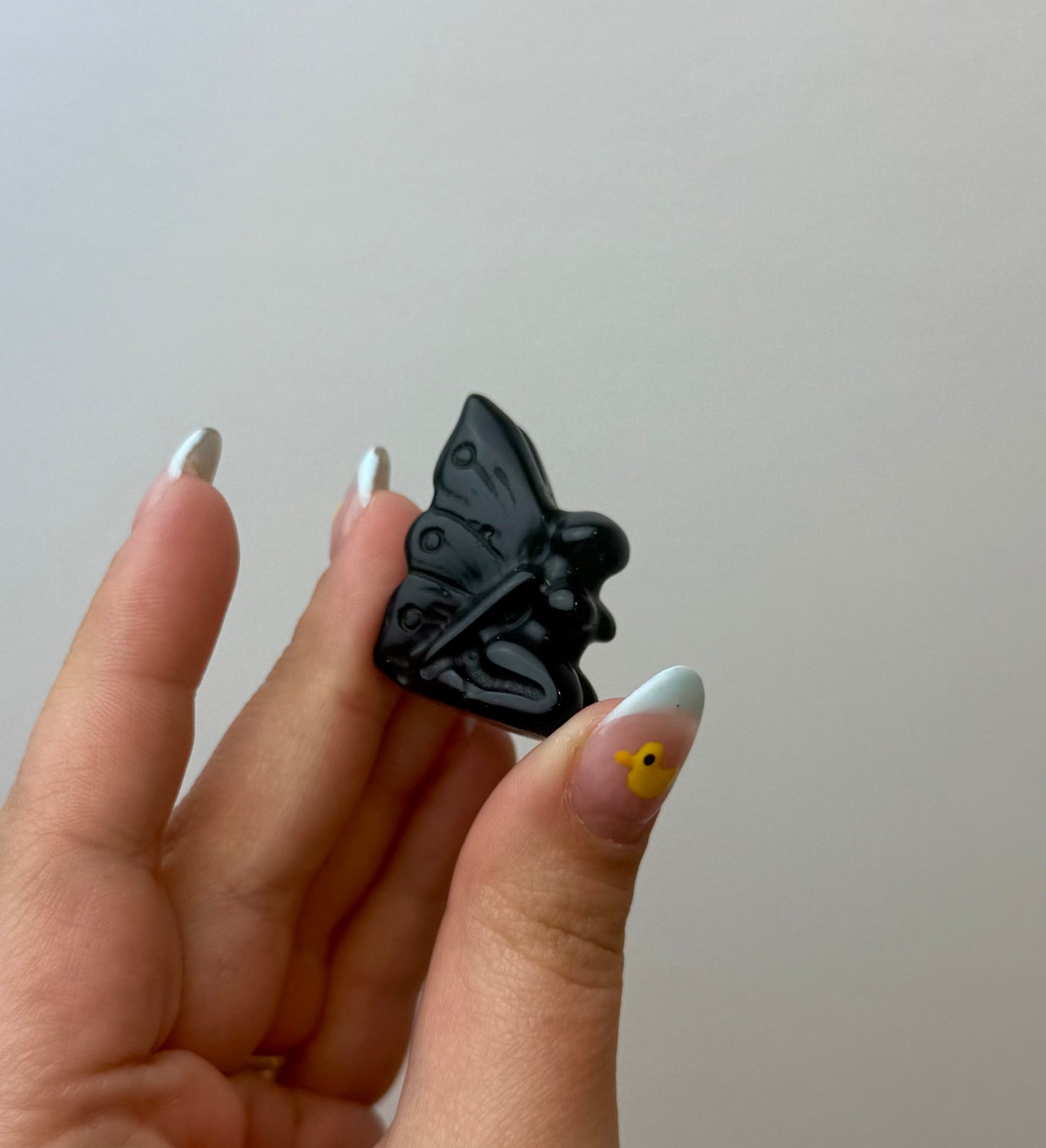 Obsidian fairy carving
