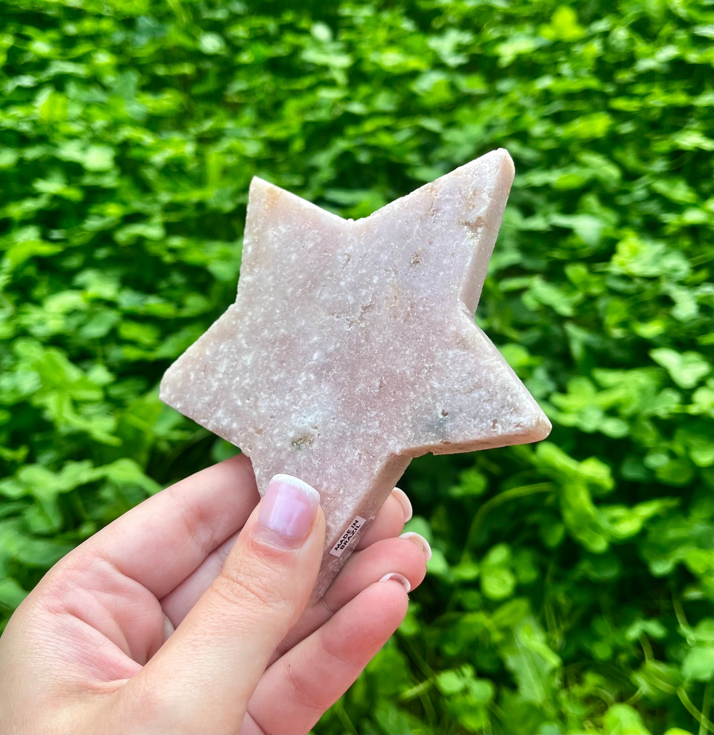 Pink amethyst star carving