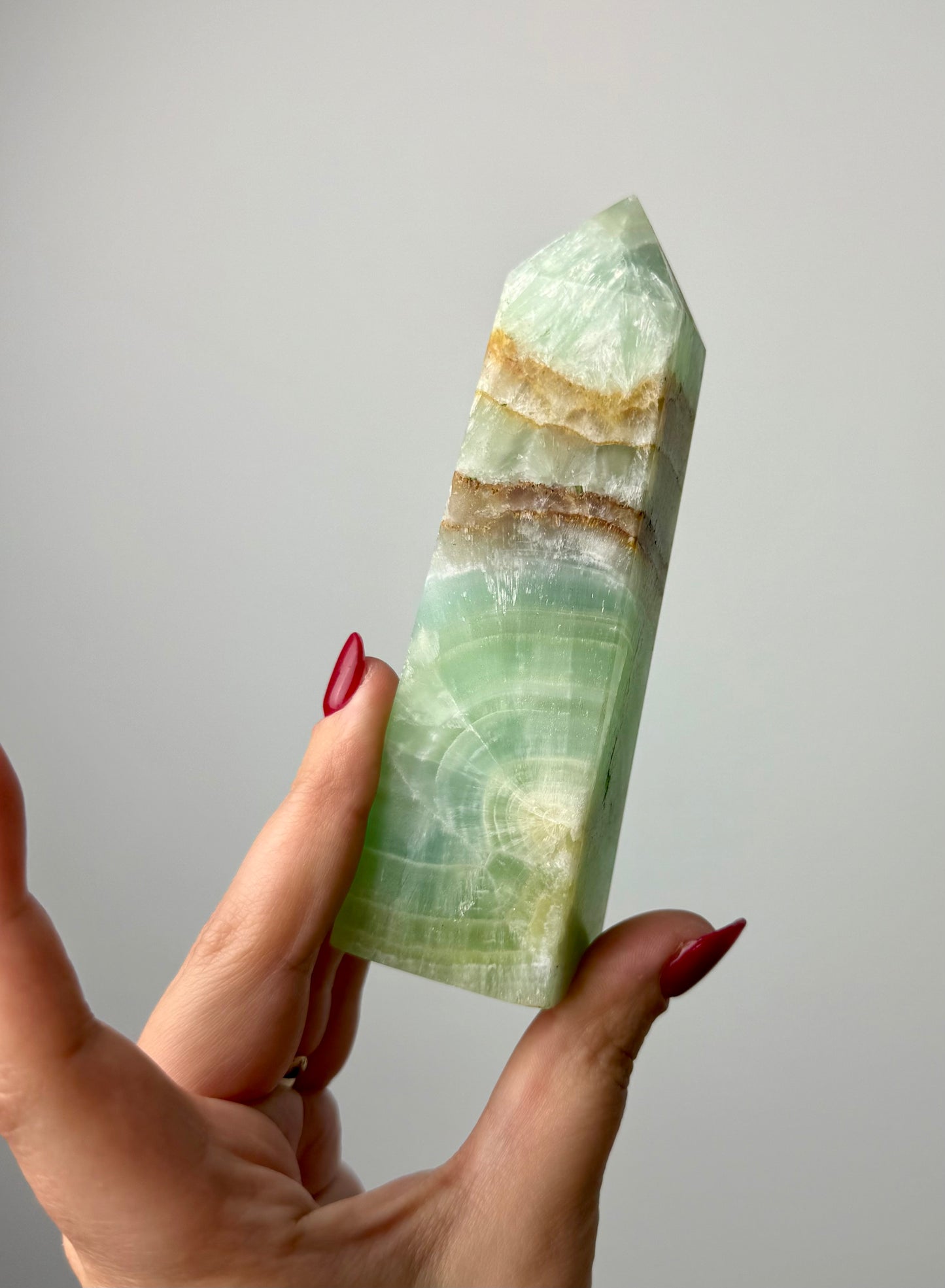 Pistachio green calcite tower