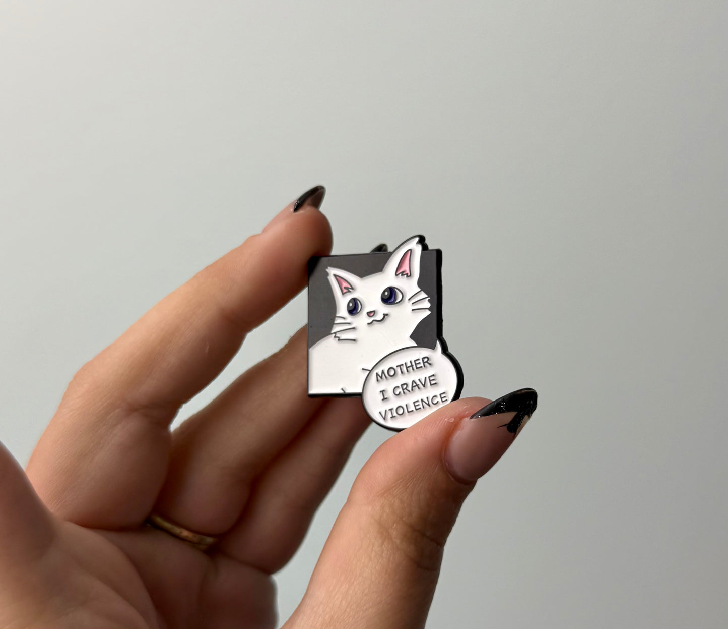 Violence cat enamel pin