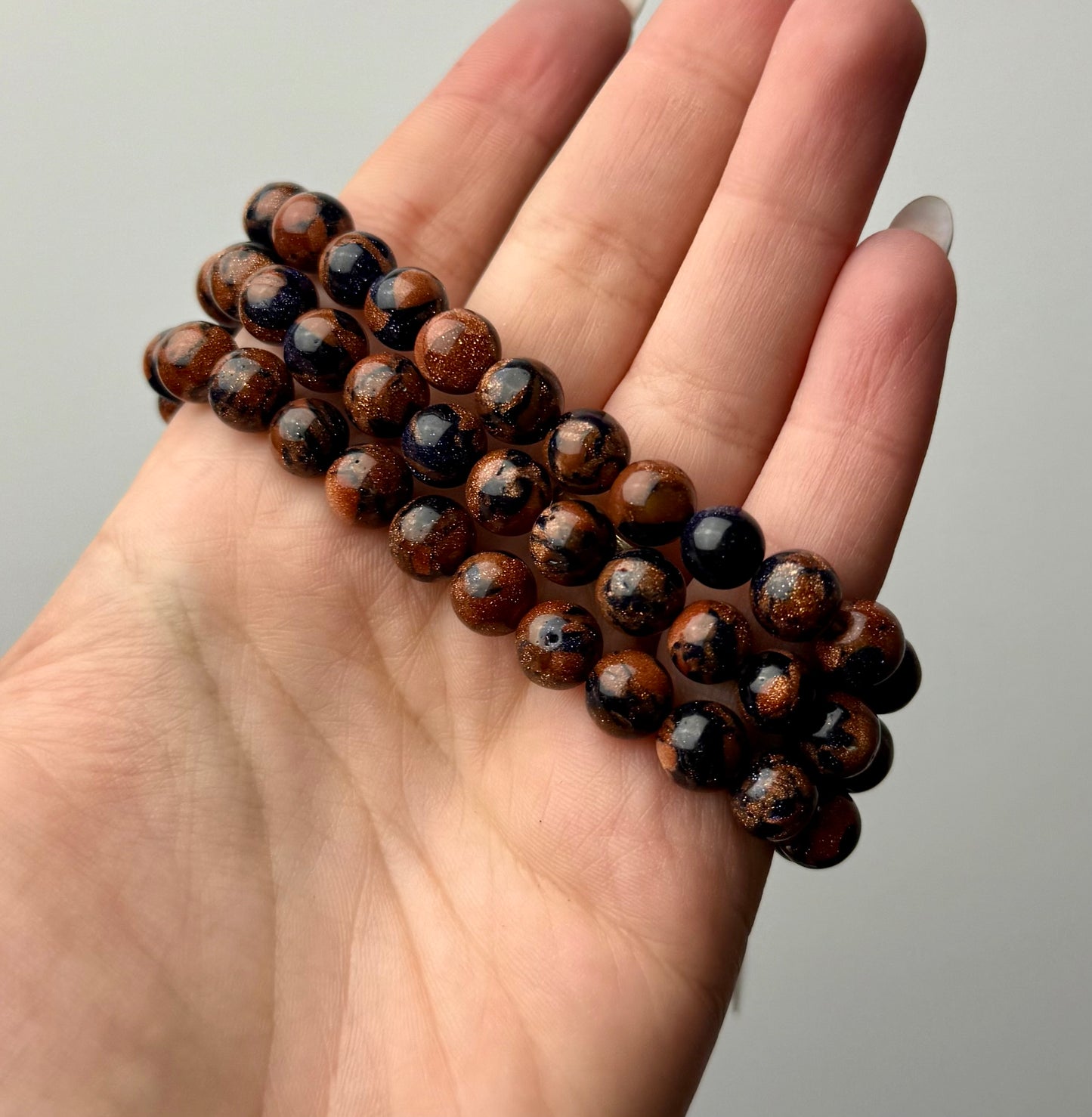 Man made material gold/blue goldstone mix bracelets