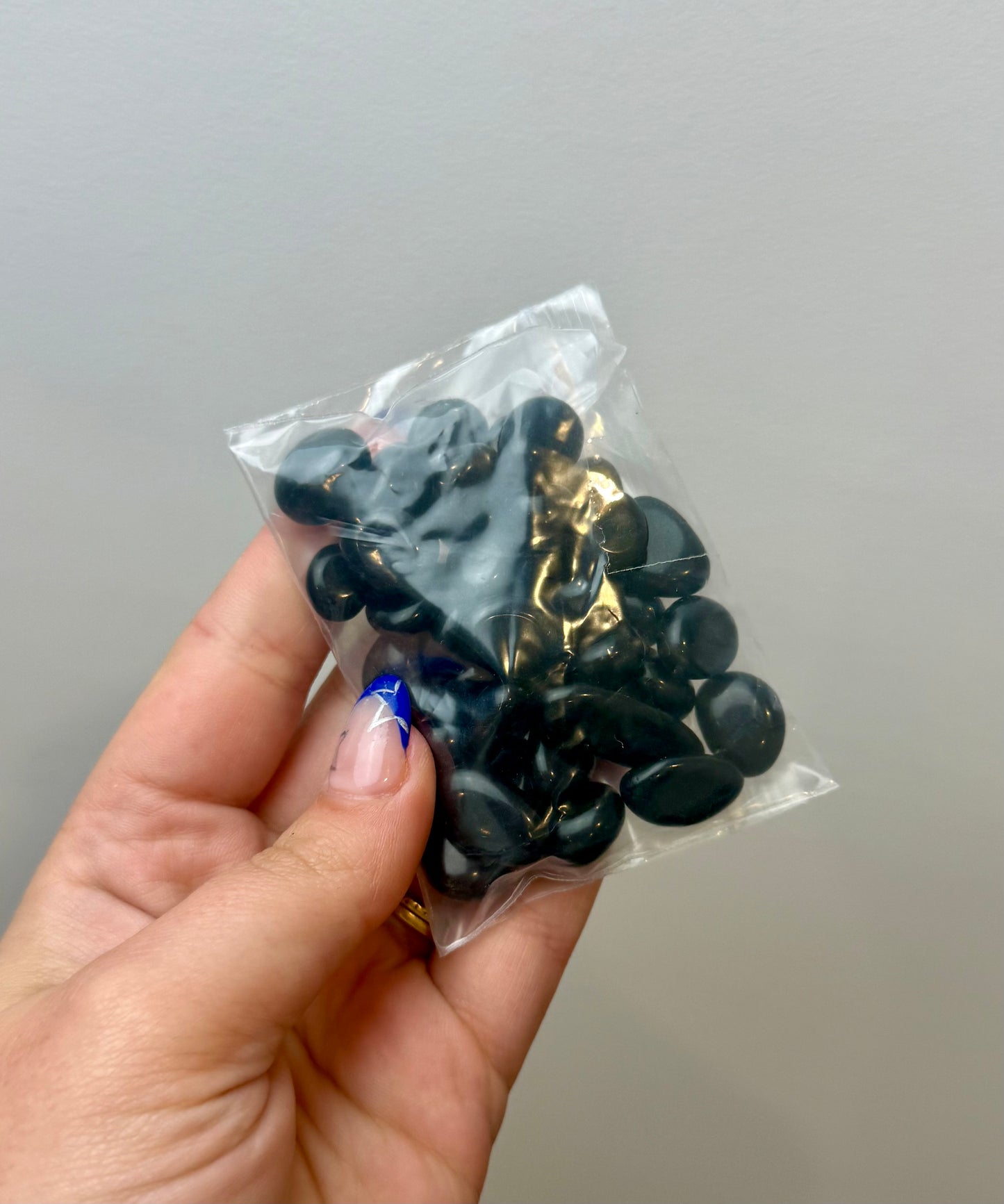Obsidian pebble bags