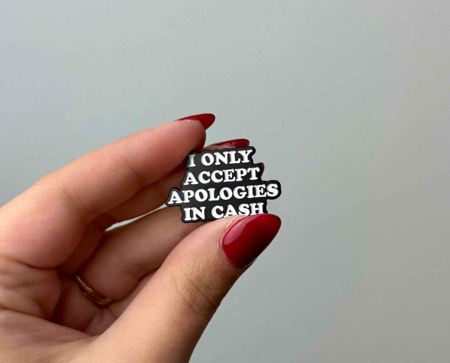 Apologies cash enamel pin ￼