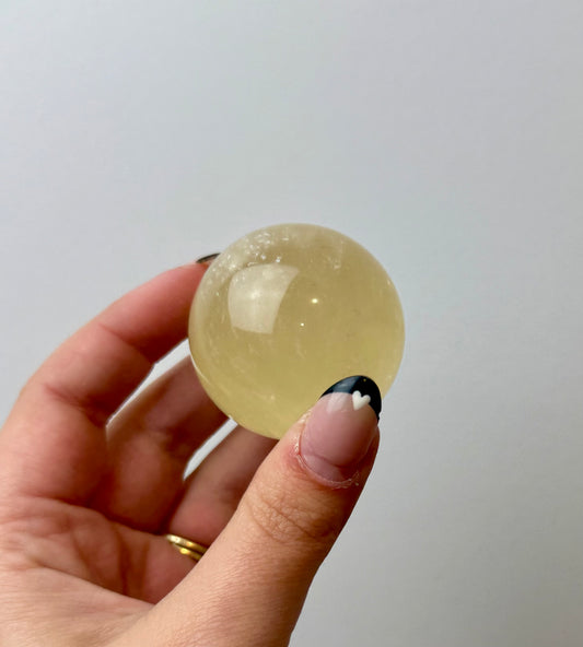 Honey calcite sphere