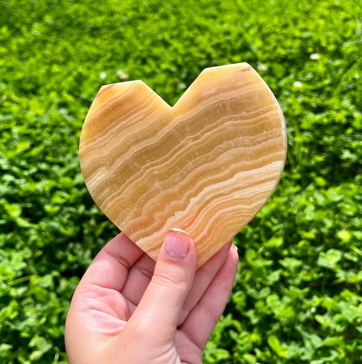 Orange calcite heart carvings