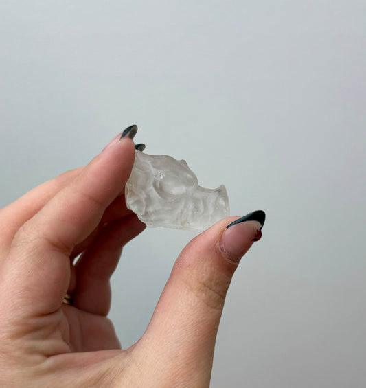 Clear quartz dragon head carving