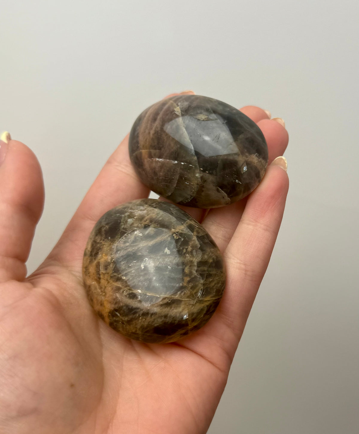 Black moonstone palm stones