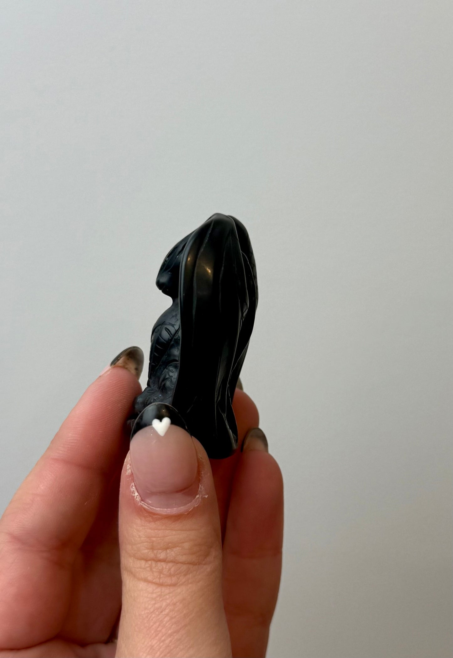 Obsidian dragon carving