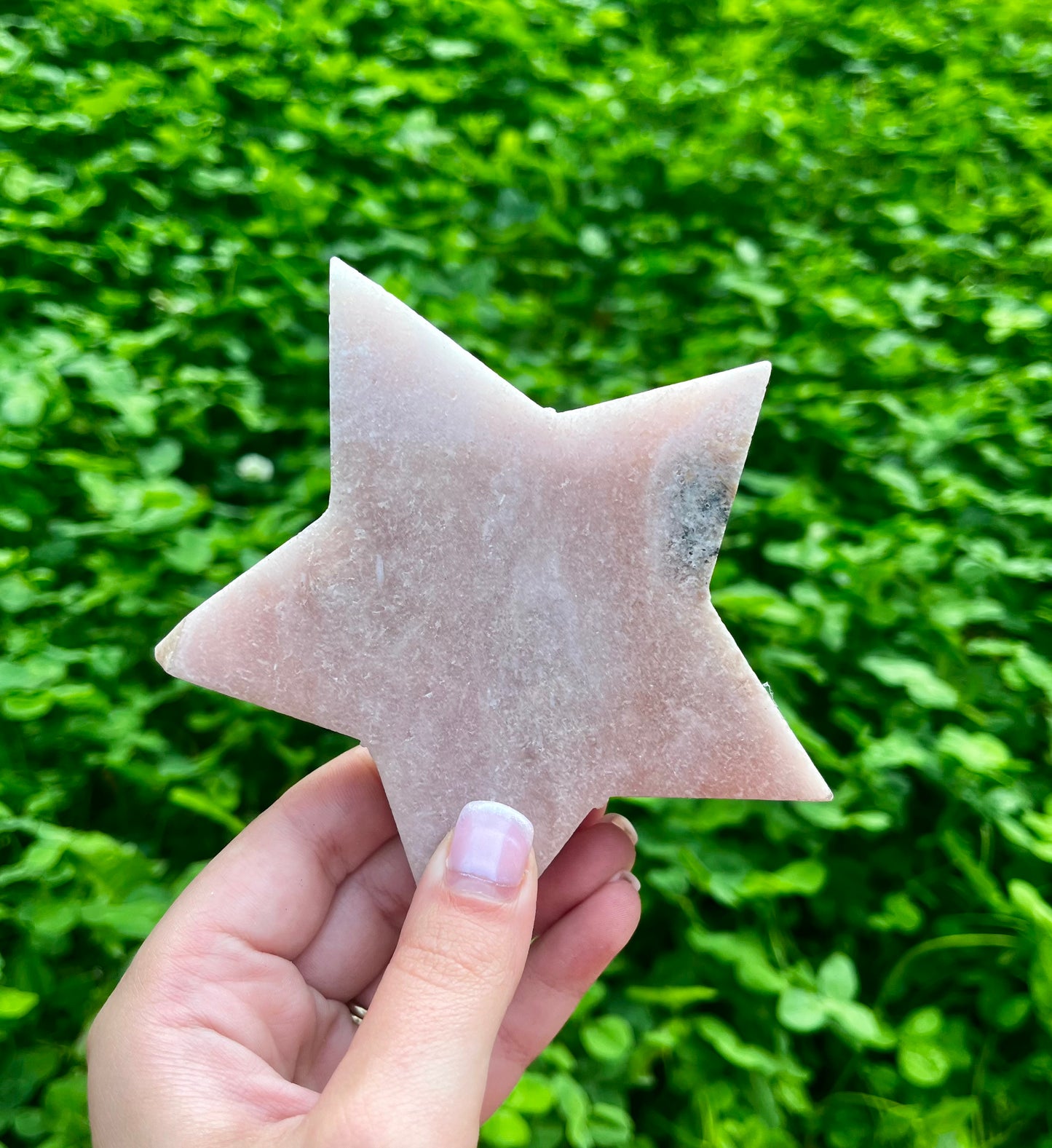 Pink amethyst star carving