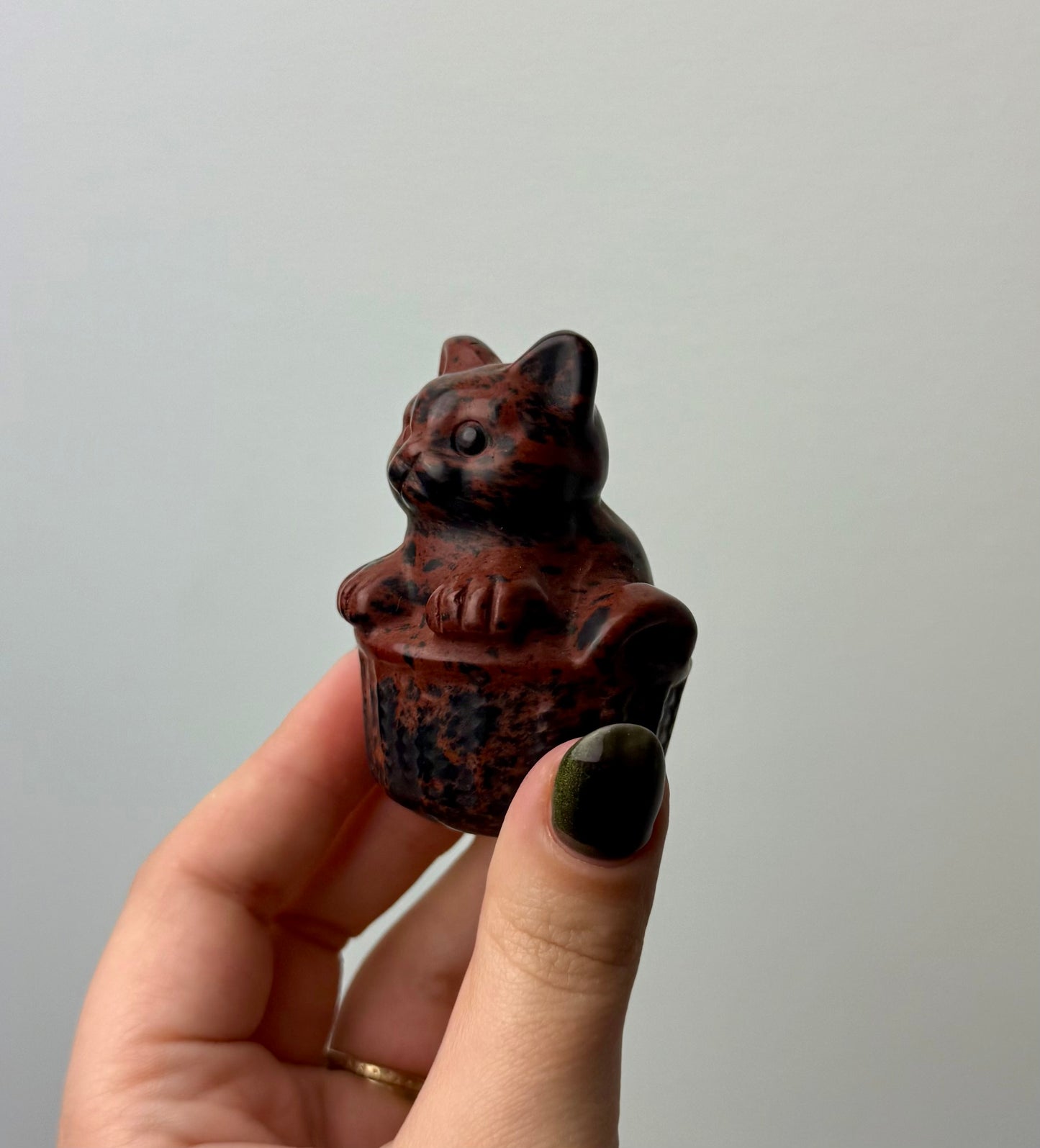 Cat in a basket carving