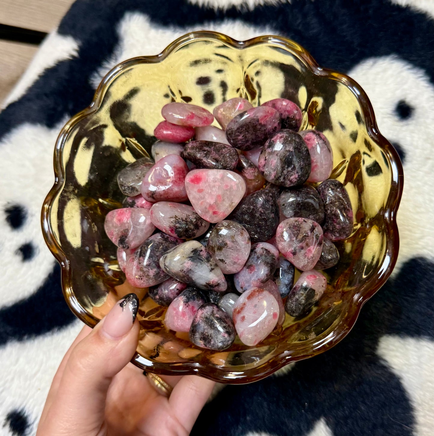 Icy rhodonite tumbles