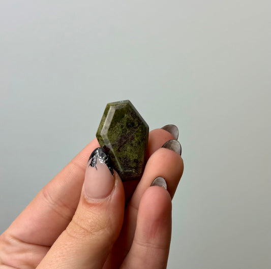 Dragon blood jasper coffin carving