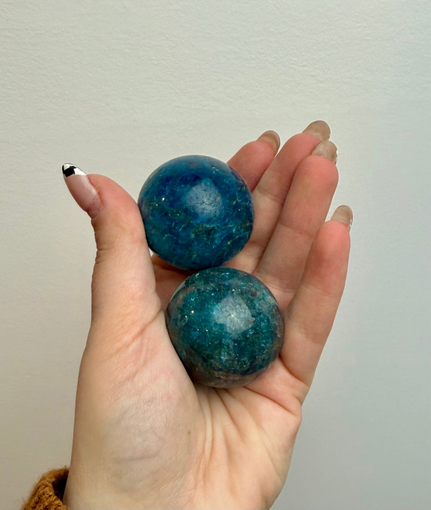 Blue apatite spheres