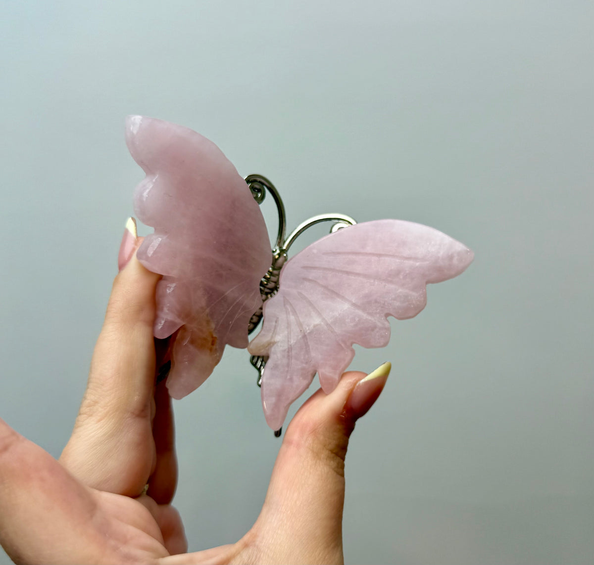 Rose quartz butterfly carving
