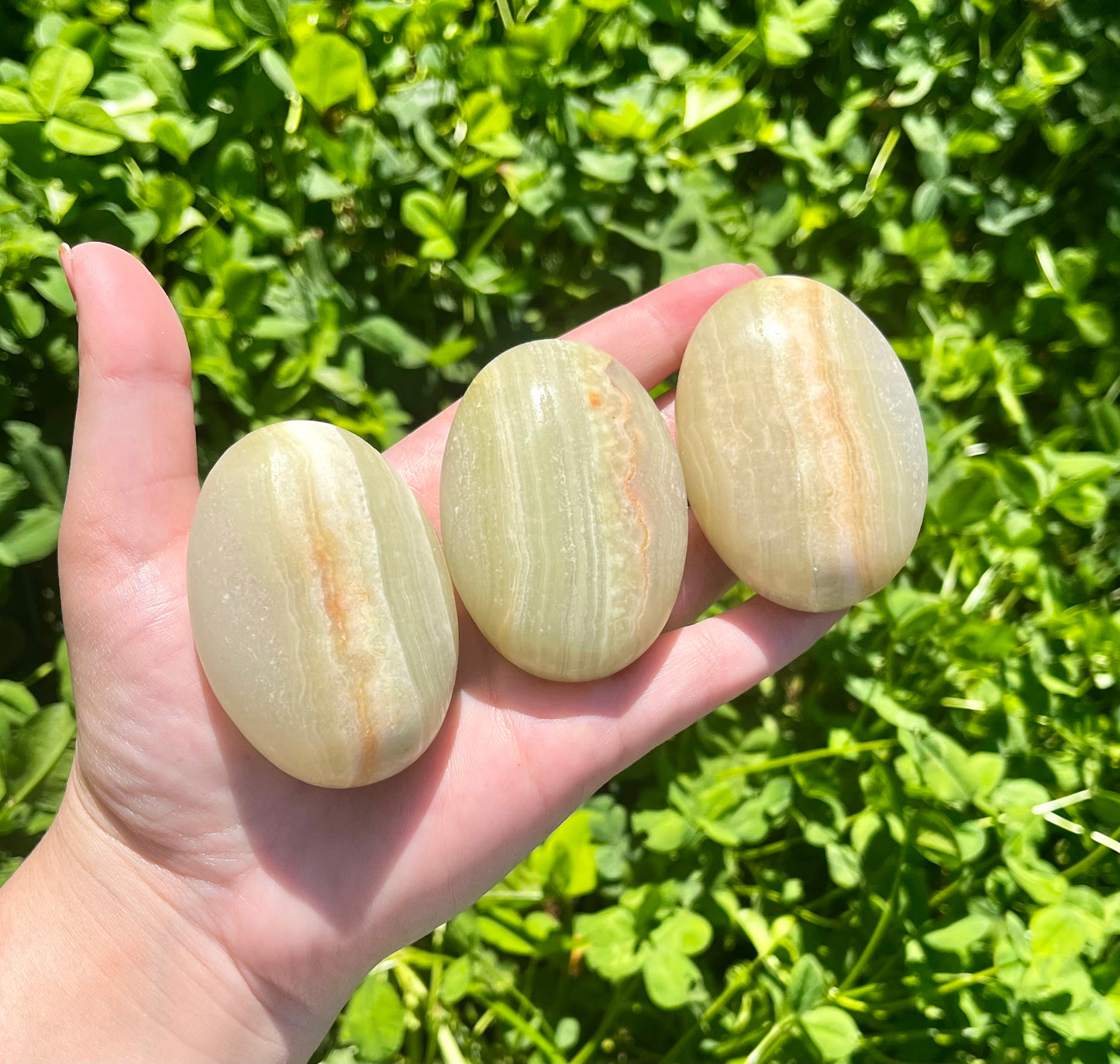 Green onyx palm stones