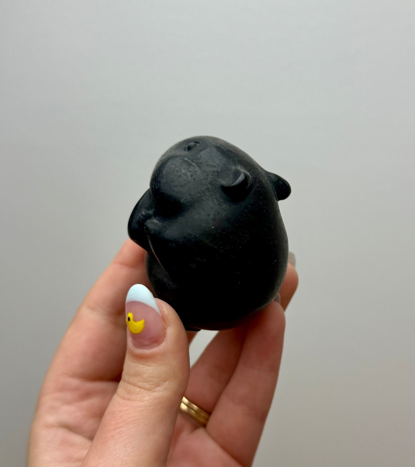 Obsidian hamster carving