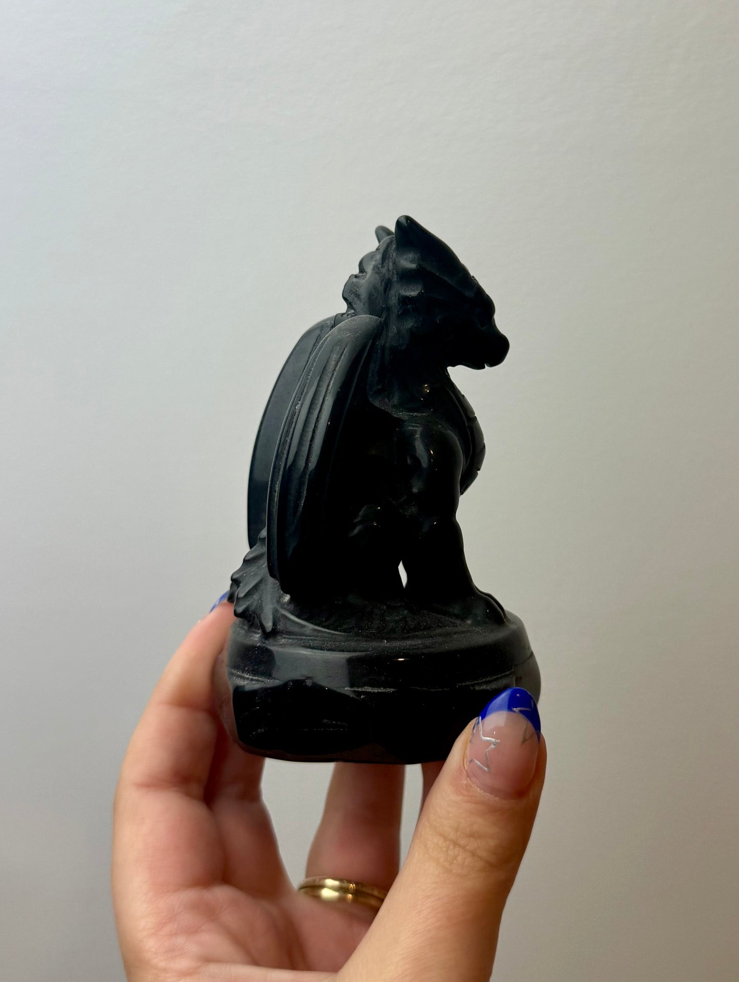 Obsidian dragon carving
