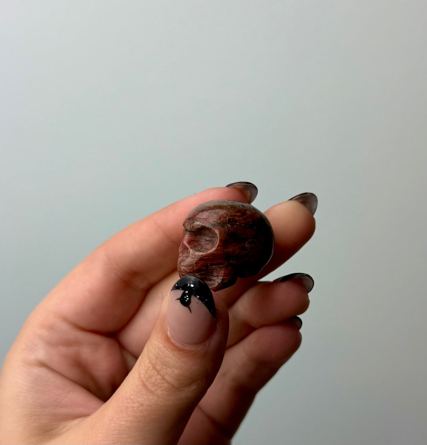 Brecciated jasper skull carving