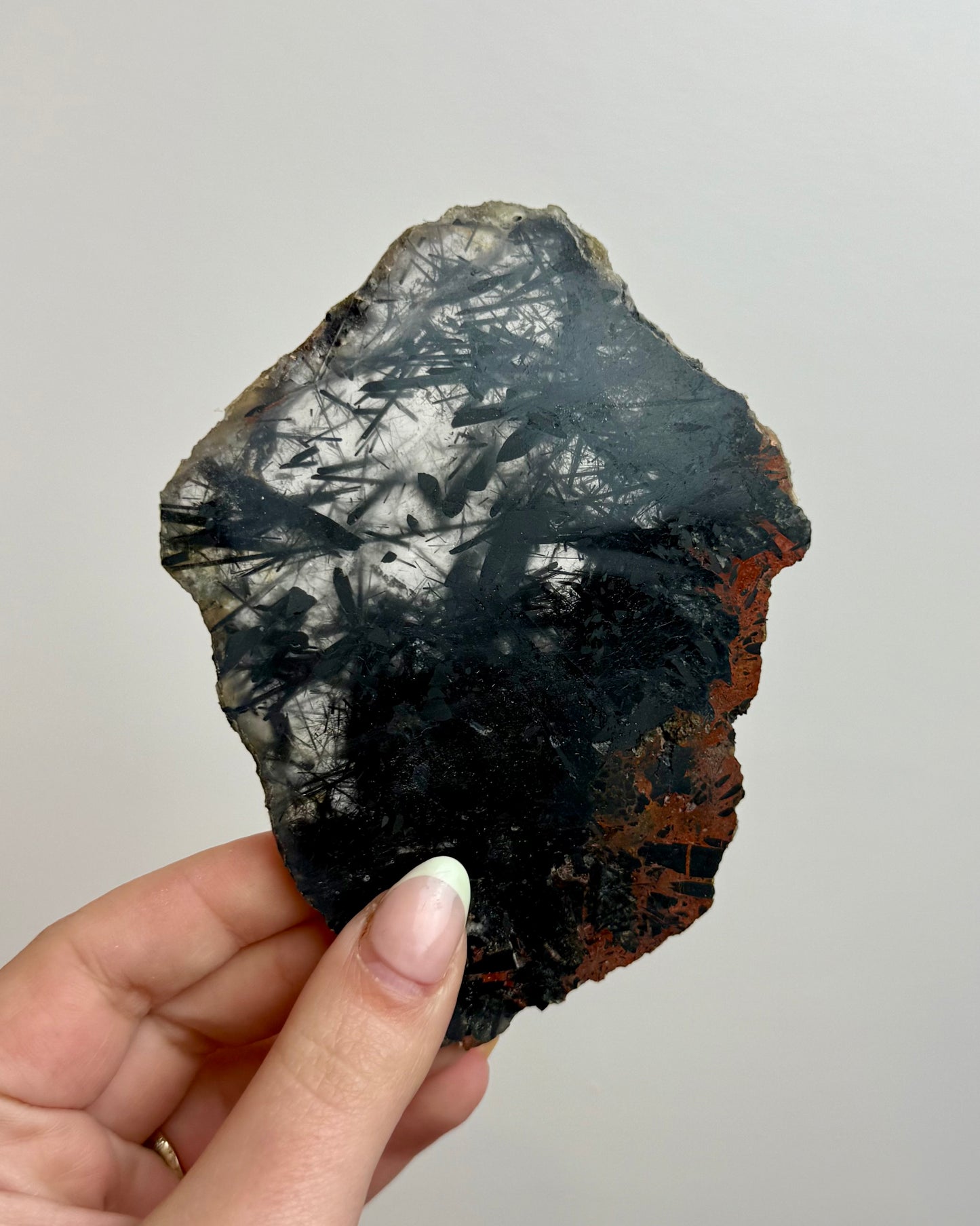 Black tourmaline in quartz slab