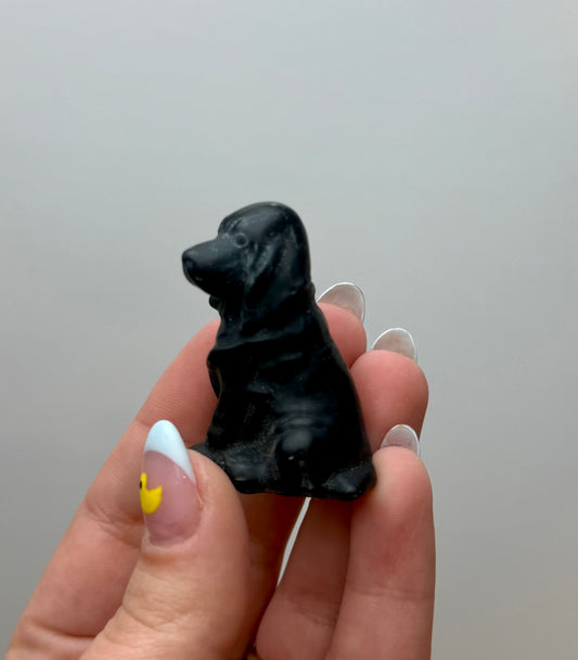 Obsidian dog carving