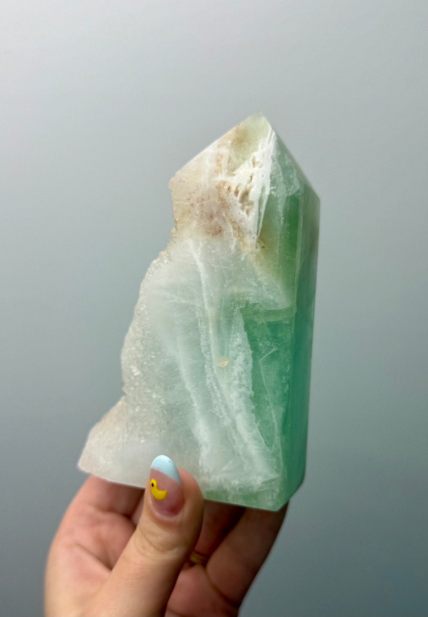 Half raw fluorite tower