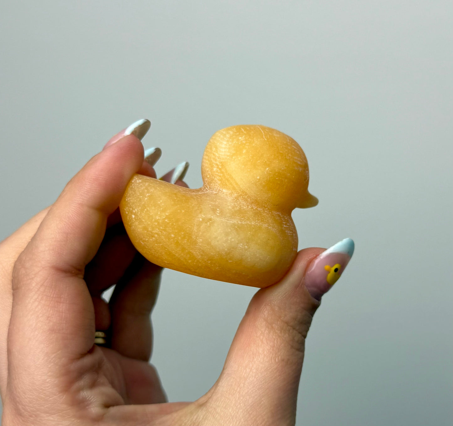 Orange calcite duck carvings