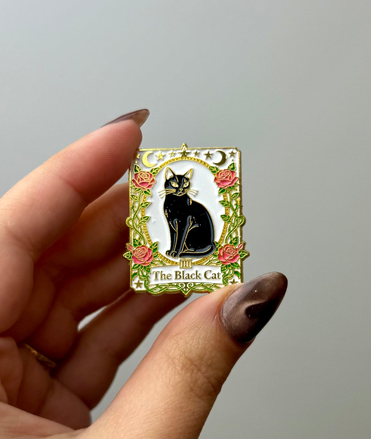 Black cat enamel pin
