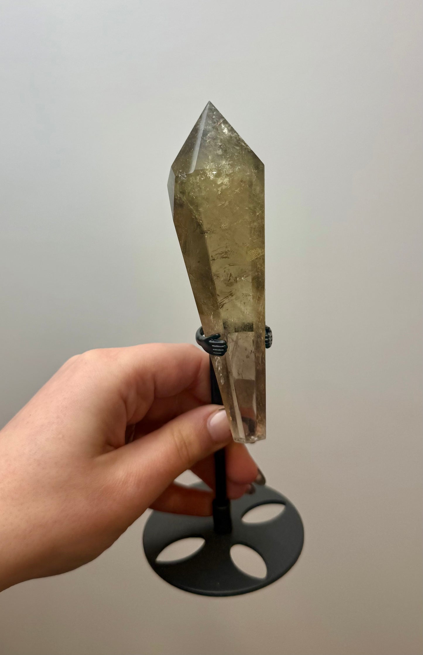 Smoky quartz wand on a stand