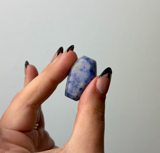 Sodalite coffin carving