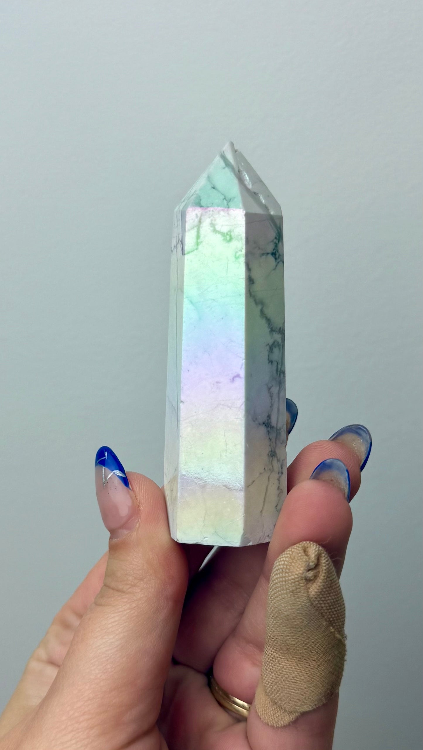 Altered aura howlite tower