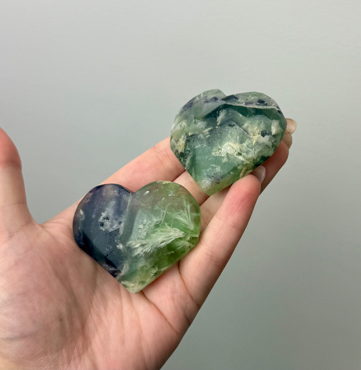 Feather fluorite heart carvings