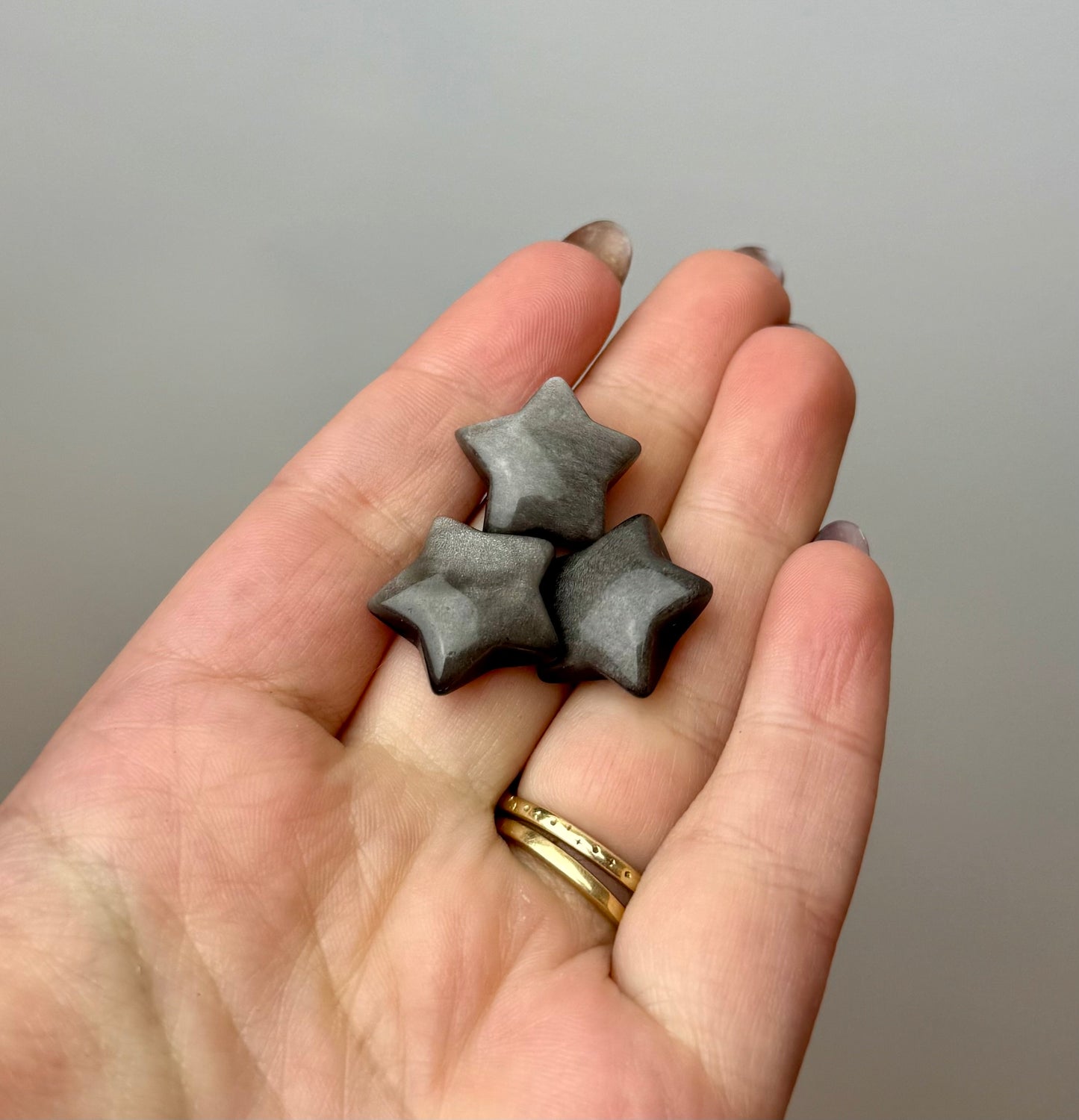 Silver sheen obsidian star carvings