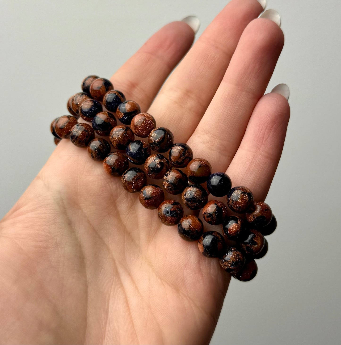 Man made material gold/blue goldstone mix bracelets