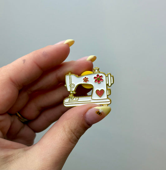 Sewing machine enamel pin
