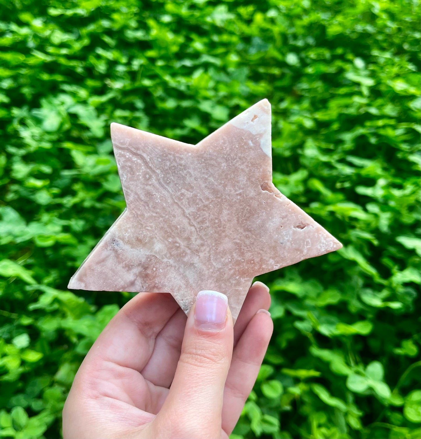 Pink amethyst star carvings