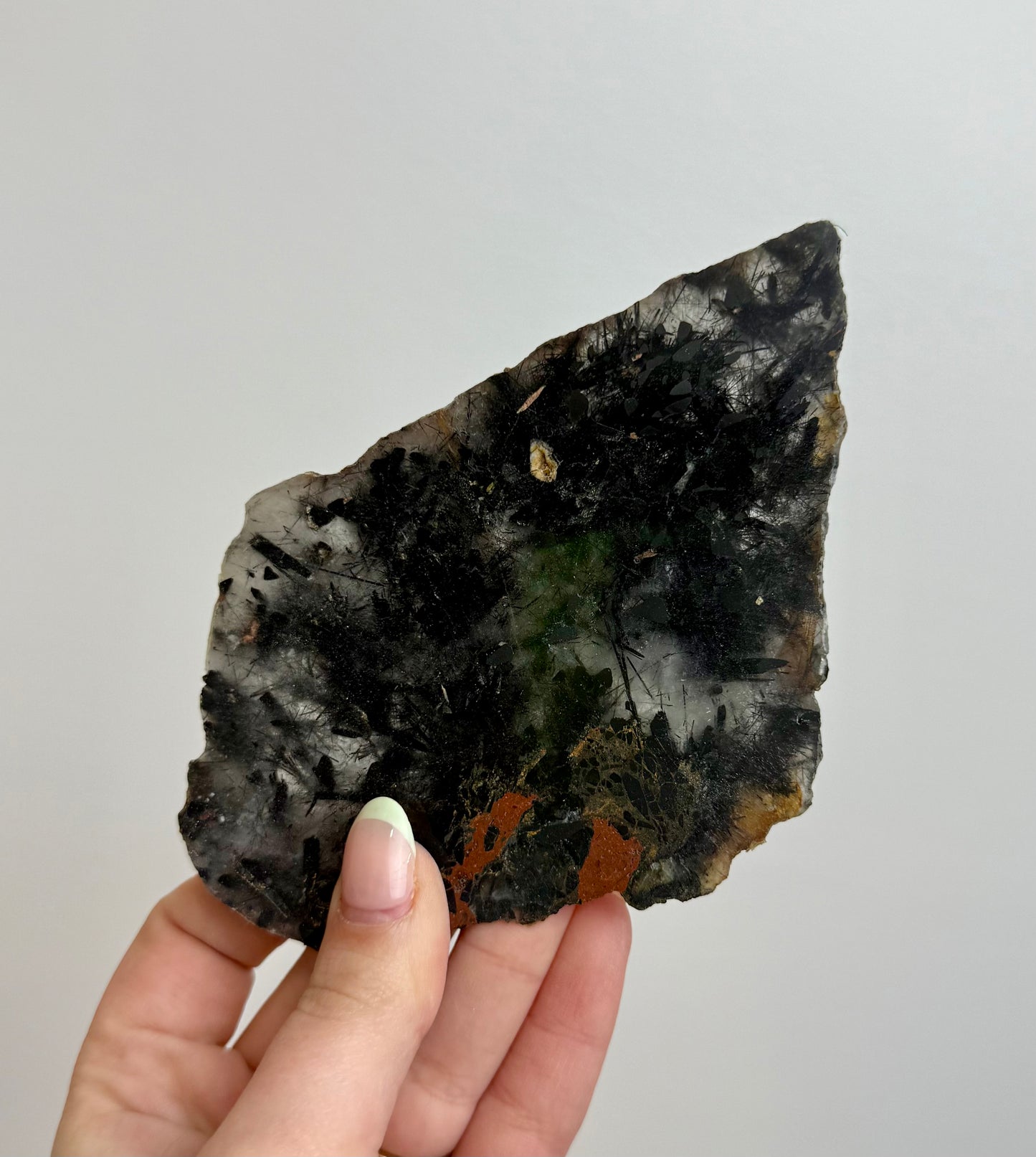 Black tourmaline in quartz slab