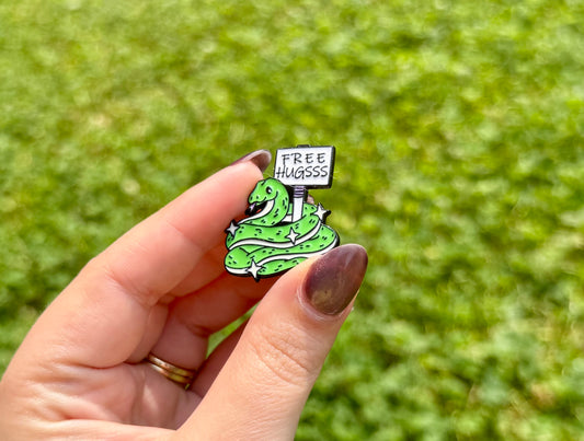 Snake free hugs enamel pin